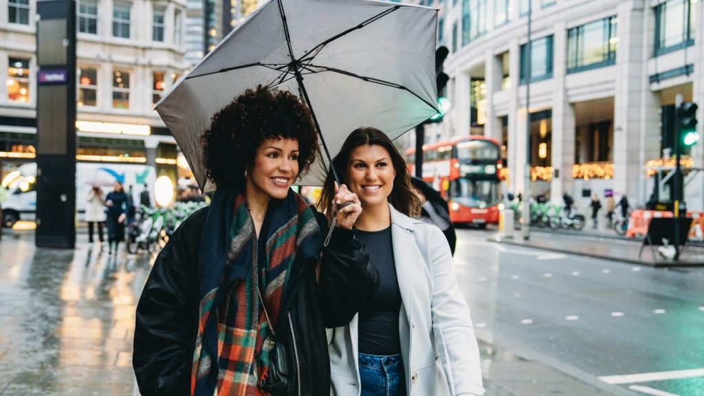Navigate Rainy Streets With Confidence Carrying An Umbrella That Resists Gusts